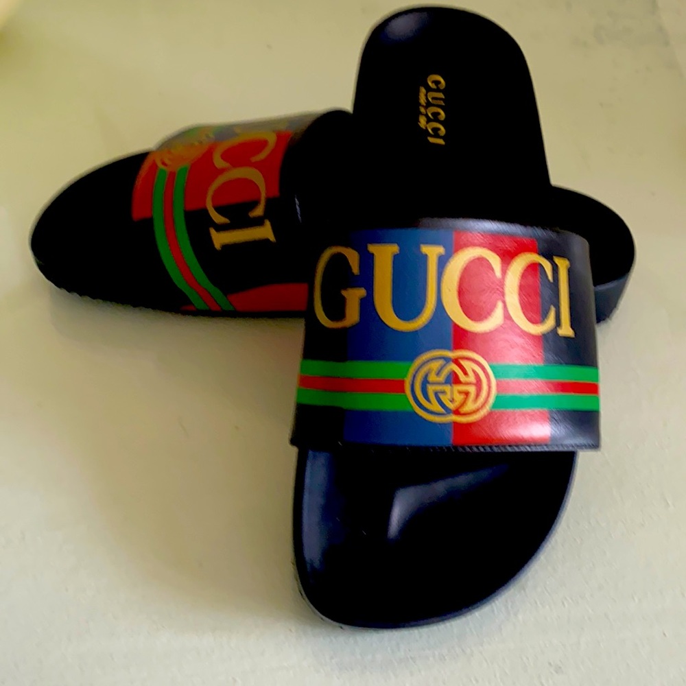 Gucci slides black with red,green,blue,and gold colors made in Italy